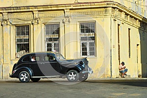 Old antique car at old street of Havana