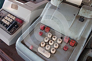 Old antique cash register, adding machines or antique calculate