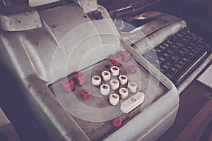 Old antique cash register, adding machines or antique calculate