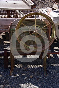 Old antique farm equipment flying in disrepair