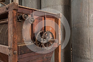 Old antique mill equipment with gears and wheels