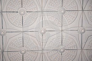 Old antique plaster ceiling with floral elements