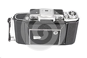 Old, antique pocket camera. The black camera is covered with a black leather handle. Front view on a white background