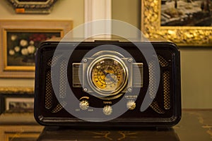 Old antique radio with golden parts