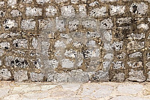 Old antique stone wall and pavement texture
