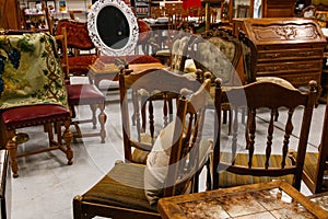 Old antique wooden furniture in an antique shop