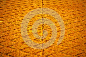 Old antislip corrugated and rusty metal plate - toned image