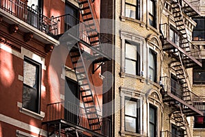 Old apartment building with fire escapes, Manhattan