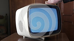 Old appliances, turn off of portable black and white television