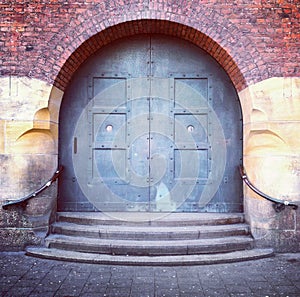 Old arched door and steps photo