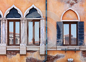 Old arched windows of Venetian house