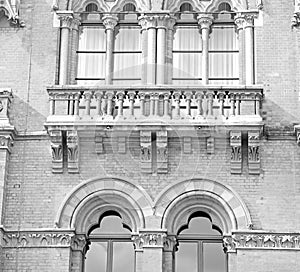 old architecture in london england windows and brick exterior wa