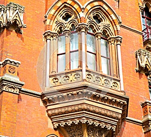 old architecture in london england windows and brick exterior wa