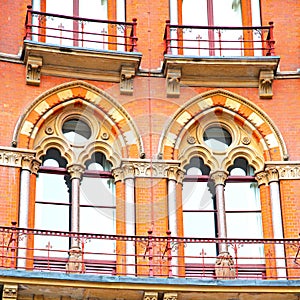 old architecture in london england windows and brick exterior