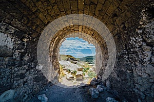 Old archway tunnel through old fortification wall