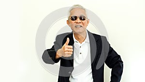 Old Asian senior man casual business suit with happy face and sungla photo