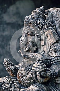 An old Asian statue of Ganesha god