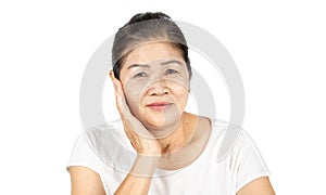 Old asian woman in isolated studio head shot with beauty concept