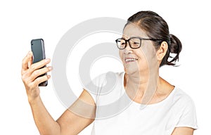 Old asian woman using smart phone for social media lifestyle