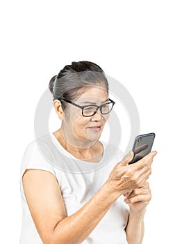 Old asian woman using smart phone for social media lifestyle