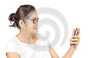 Old asian woman using smart phone for social media lifestyle