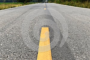 Old asphalt road in countryside