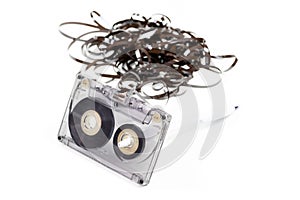 Old audio cassette with loose tape