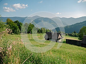 Old authentic wood house Carpathian mountains Ukraine, Europe. Local countryside travel hiking forest trails Cottagecore