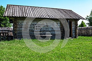 Old authentic wooden house. Remnants of Ancient house. Ancient traditional ukrainian rural cottage