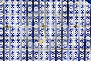 Old azulejo tiles on water fountain