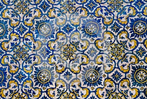 Old azulejo tiling on wall in traditional Portuguese style