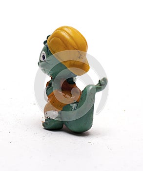 Old baby figurines of animals on a white background/old children`s figurines of animals
