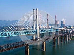 Old and New Baishatuo Yangtze River Railway Bridge under blue sky photo