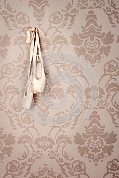 Old ballet shoes hanging