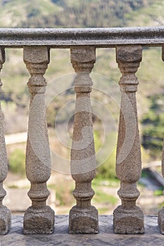 Old balusters made from stone. Architecture elements of terrace