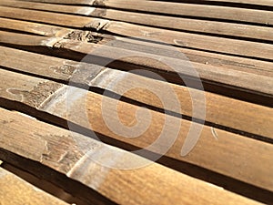 Old bamboo table with detailed outline in the sun. Empty bamboo table or meja bambu. Close up of bamboo table photo