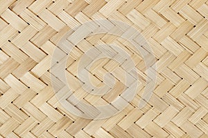 Old bamboo weaving pattern, woven rattan mat texture for background and design art work photo