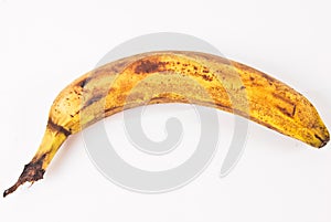 A old banana that has begun to decay photo