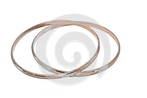 Old bangle jewelry has gold and silver color isolated on white background,macro photo,has path