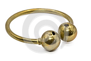 The old bangle jewelry made from brass isolated on white background,macro photo,has path