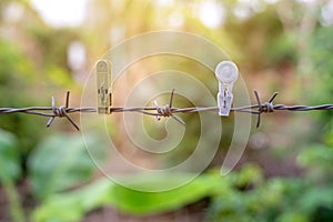 Old barbed wire on abstract bokeh background