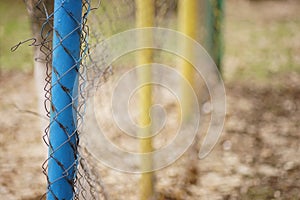 Old barbed wire fence, side view, selective focus