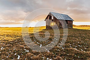 Old barn on arable land in Sweden that keeps falling apart