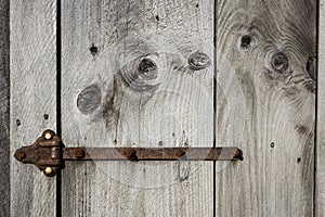 Old Barn Boards with Long Rusty Medal Hinge