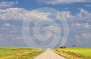 Old barn in a cloudy countryside agricultural landscape