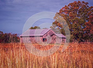 Old barn in a field in November