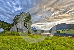 Old barn in Fjord landscape Norway