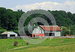 Old barn with green round roof