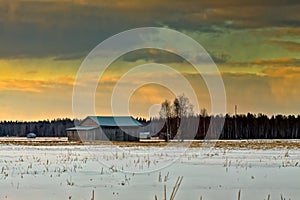 Old Barn Houses In The Springtime Sunset