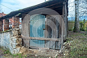 Old barn with a makeshift door